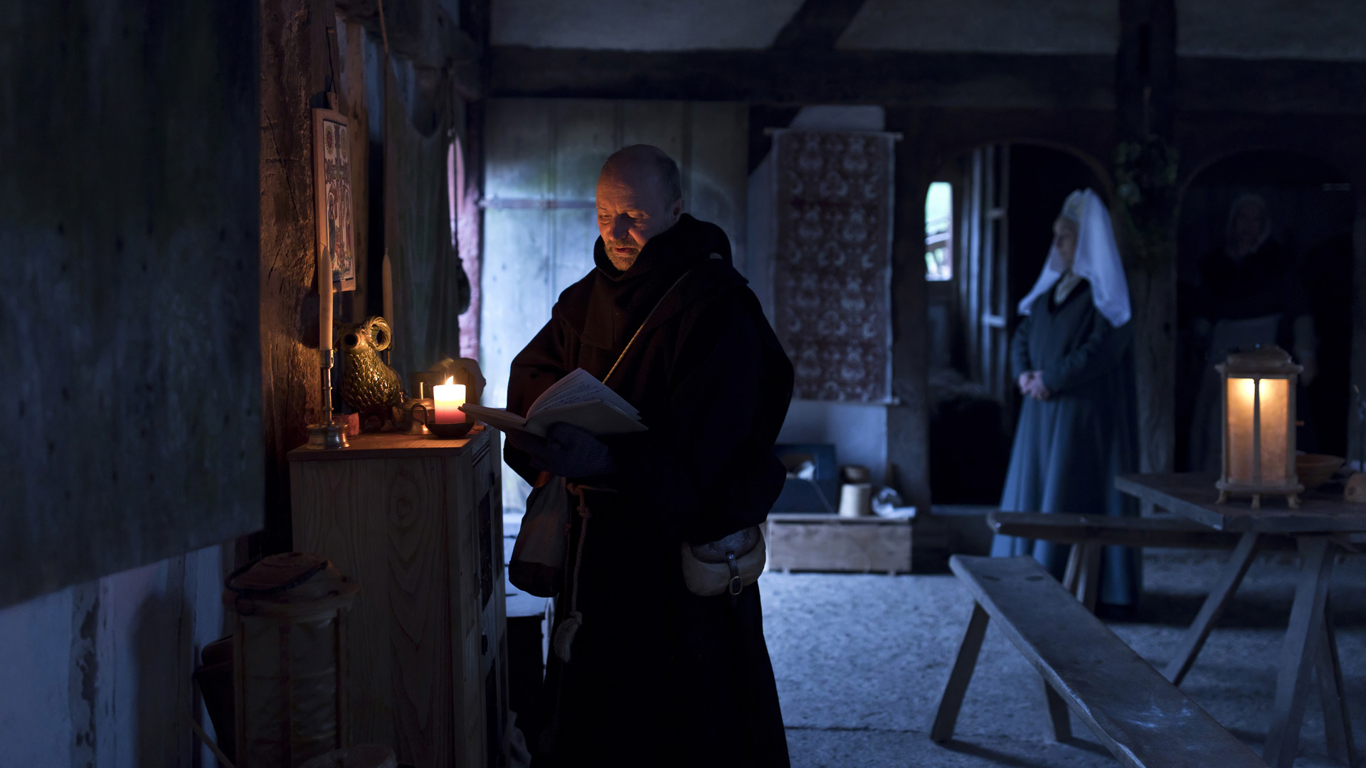 HistoryClipz Storefront Medieval man sitting in sunlit ale room